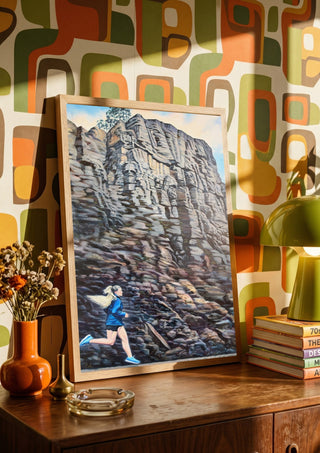 Skandinaviskt tystnad by Ramz Gadzh in a wooden frame on a sideboard against a retro patterned wall