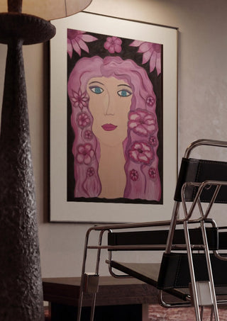 Flower Power by Carmen Coduri framed in a dim room beside a tubular steel chair