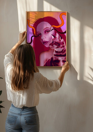 Glow And Purr by Sabrina Rosenblatt being hung on a sunlit wall