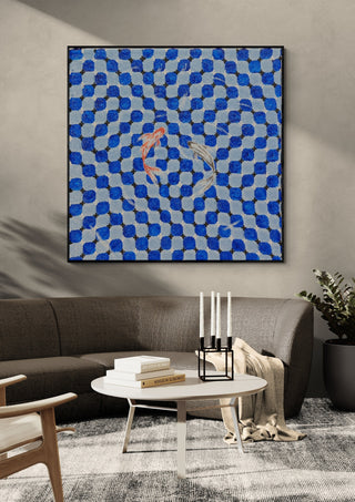 Pool by Zhan Snow in a black frame above a dark grey sofa with a round table and candlesticks