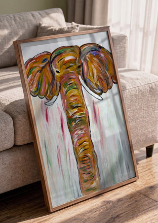 Chromatic Matriarch by Bibi in a walnut frame leaning against a grey sofa