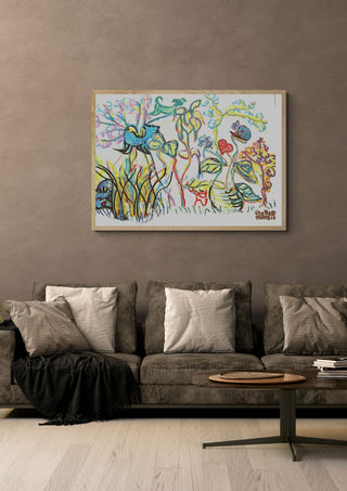 Garden in Bloom by Eva Hartman in an oak frame above a grey sofa with cushions
