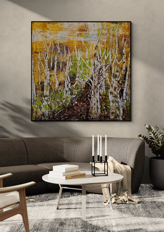 Release by Sabine Halbrock in a black frame above a grey sofa with candlesticks