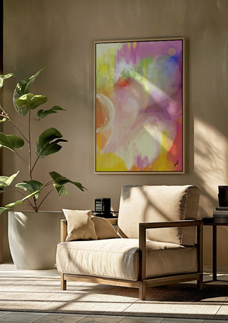 Color rond by FridaRit framed above a beige armchair beside a potted plant
