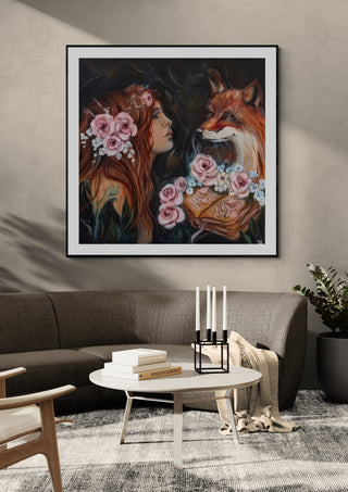 Anne´s Fox encounter by Elisa Kay framed above a grey sofa with a round coffee table