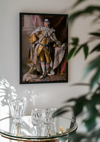 Cool King by Dikhotomy in a black frame above a glass table with crystal glassware