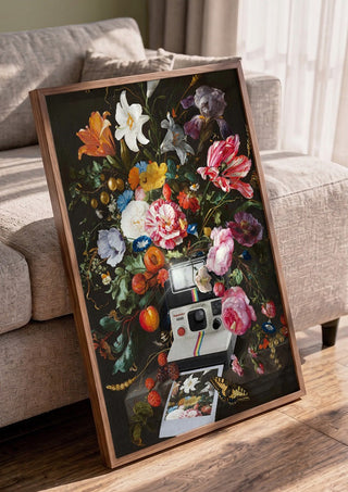 Floral Instant Photo by Dikhotomy in a walnut frame leaning against a grey sofa