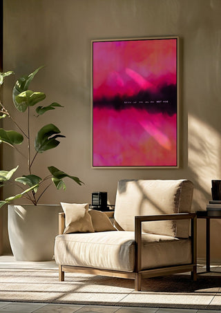 Never let them know your next move by Astrid Lind framed above a beige armchair beside a potted plant