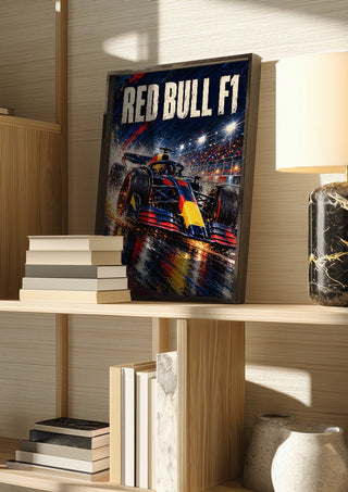 Red Bull F1 by Danii Steinfeldt in a dark frame on a wooden shelf beside books and a lamp