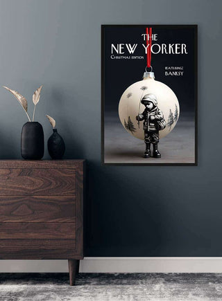 Framed New Yorker cover featuring Banksy art of a child in a hoodie beside a Christmas ornament.