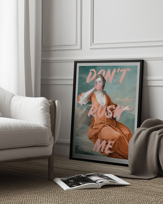 Framed Sassy Bubble Gum Portrait by Talitha McQueen, featuring "DON'T RUSH ME" text, leaning against a wall.