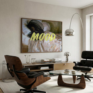 Framed "Woman In Repose" by Talitha McQueen displayed above a modern living room setup.