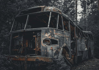 Decay (5) by Lone Gjessing - a burnt-out bus standing among tall pines in a dark forest