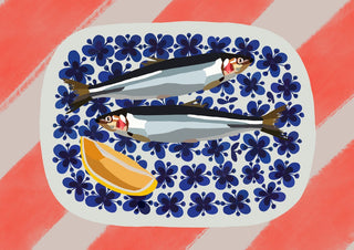 Fishys on plate by Astrid Lind - two fish and a lemon wedge on a blue flowered plate