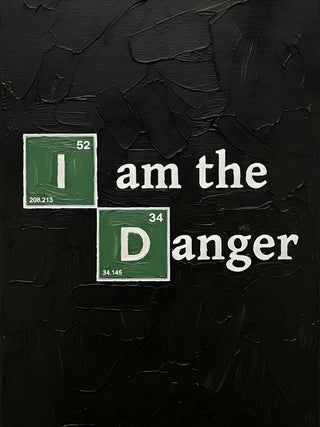 Black background with white text: "I am the Danger," using periodic table symbols for Iodine and Dysprosium.