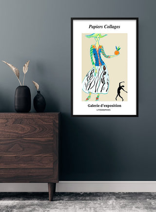 French art-inspired collages poster with abstract figures, framed and displayed above a modern wooden dresser.