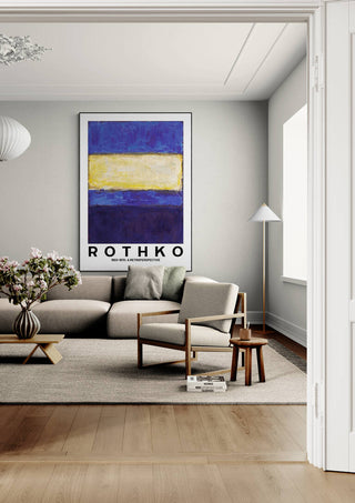 Rothko Yellow on Blue artwork displayed above a beige sofa in a modern living room setting.