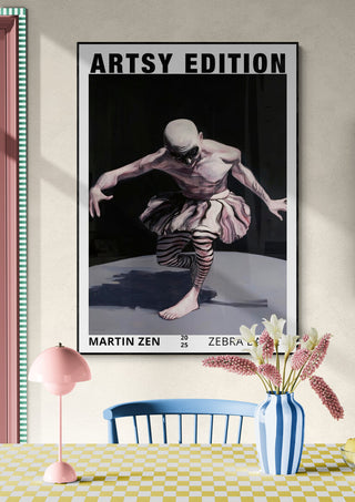 Poster of Zebra Ballet by Martin Zen displayed on a wall above a table with flowers, lamp, and blue chair.
