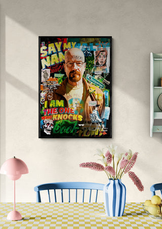 Colorful Breaking Bad 2 - Ricardo Noble poster on a wall above a dining table with flowers and decor.