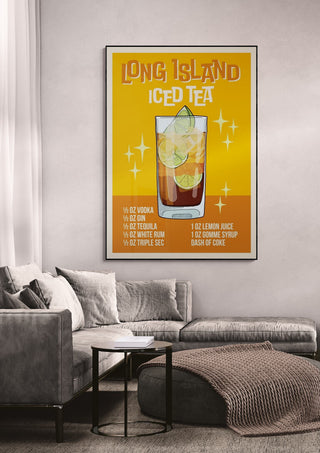 Framed Long Island Iced Tea wallchart with recipe, displayed above a modern sofa in a living room setting.