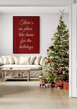Cozy living room with a decorated Christmas tree and a sign reading “There’s no place like home for the holidays.”