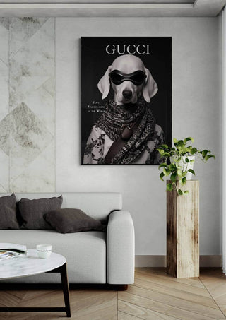 A stylish dog wearing sunglasses and a scarf on a Gucci fashion poster, displayed in a modern living room.