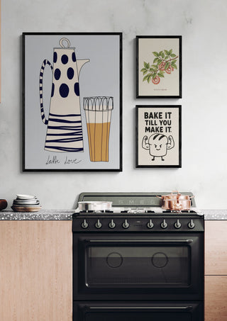 Framed Donutus Arboris botanical print hanging on a kitchen wall above a stove and countertop.