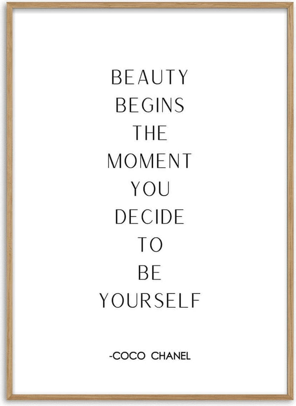 Minimalist poster with the quote "Beauty begins the moment you decide to be yourself" by Coco Chanel.