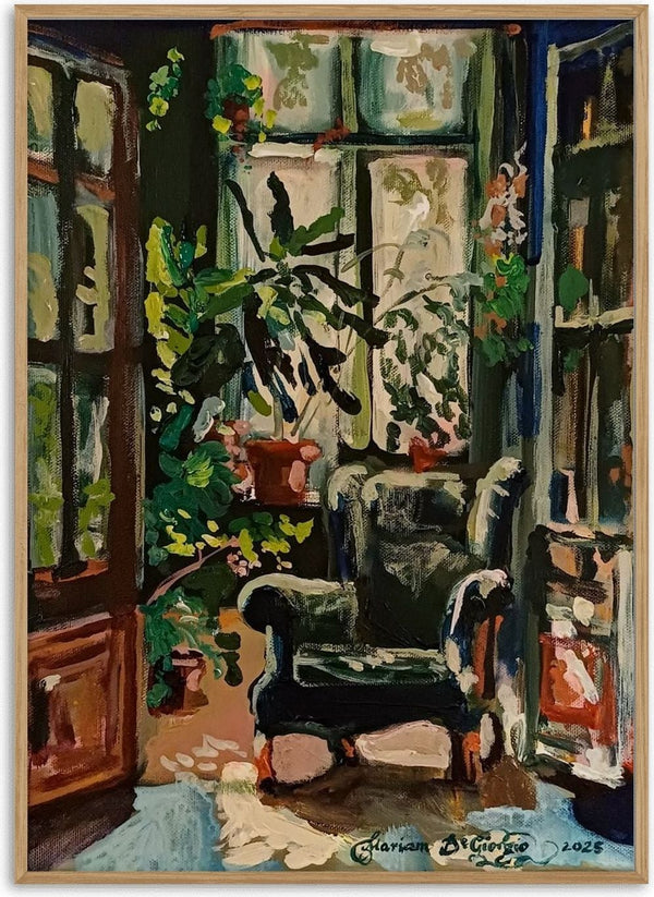 Conservatoire by Mariam De Giorgio - green armchair among potted plants in a sunlit conservatory