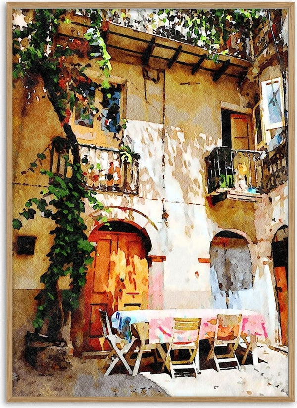 Italian courtyard by Massimo Frascogna - a vine-covered ochre facade with a laid table
