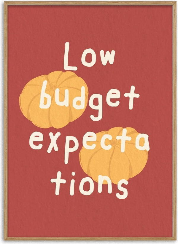 Low Budget Expectations by Jakob Falkenberg - two orange pumpkins and hand-lettered type on brick red