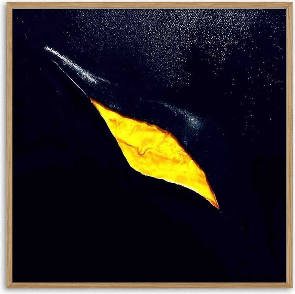 The golden crack by Marcel Herrmann - a glowing gold rift running diagonally across a deep blue-black ground