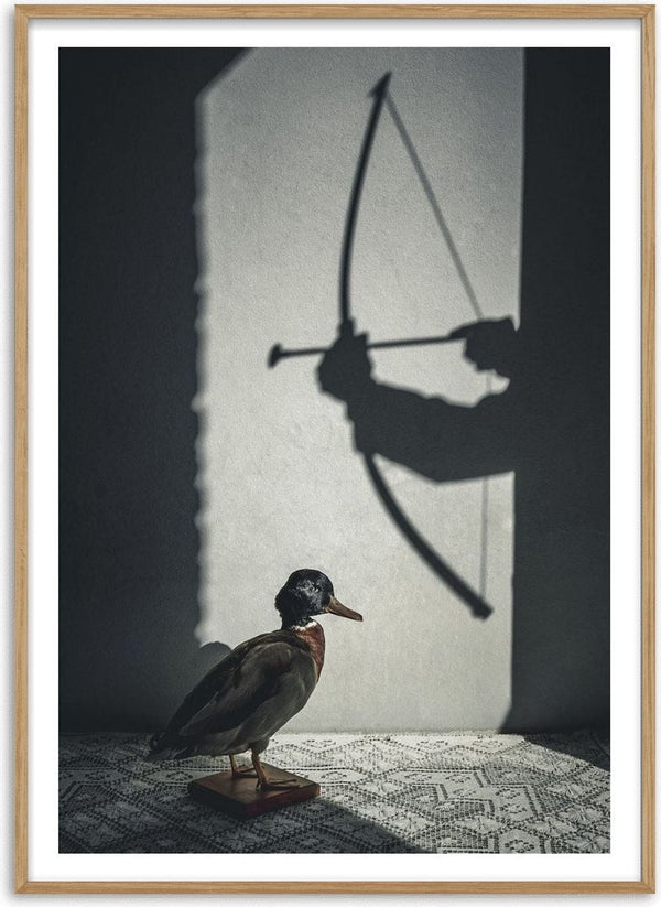 The hunt by Lone Gjessing - a stuffed duck under the shadow of an archer with a drawn bow